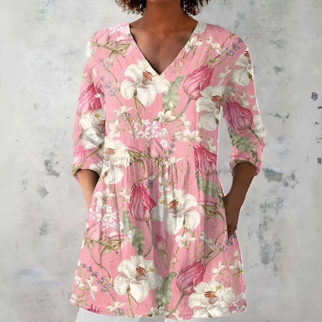 Women's retro style slim fit long-sleeved top with a printed design, shown in one of 12 available colours.