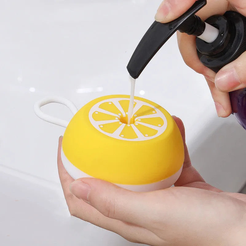 Yellow silicone pet bath brush with 3D massage head and combed hair bristles for dog and cat grooming