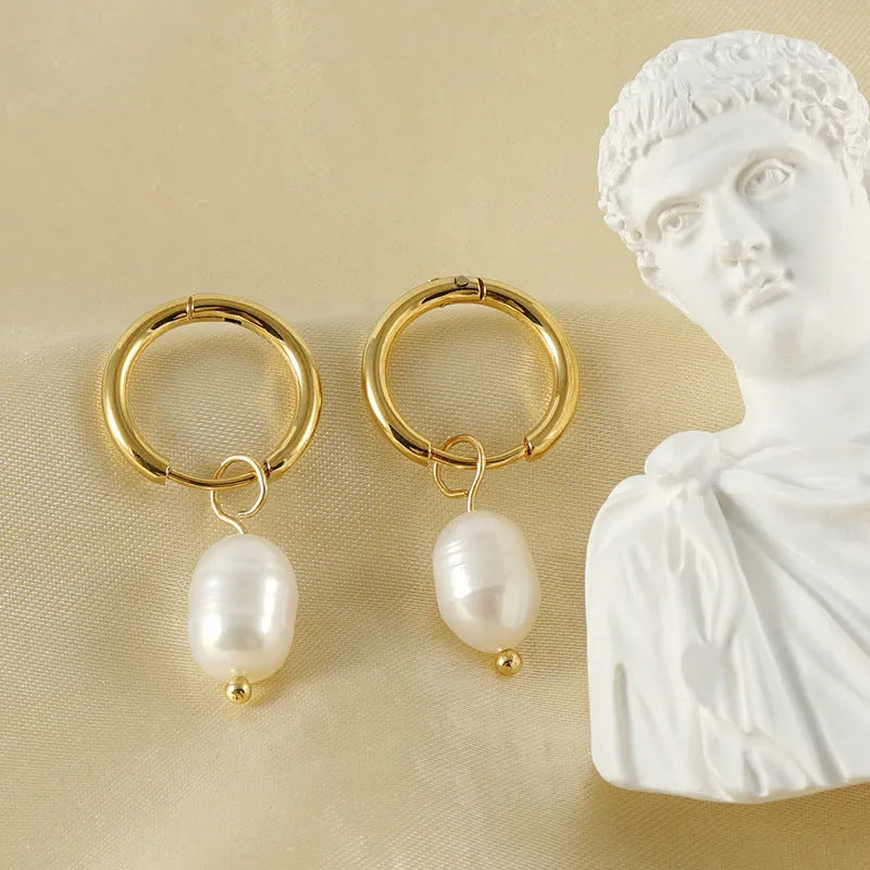 Gold geometric stainless steel earrings with pearl decorative elements for women