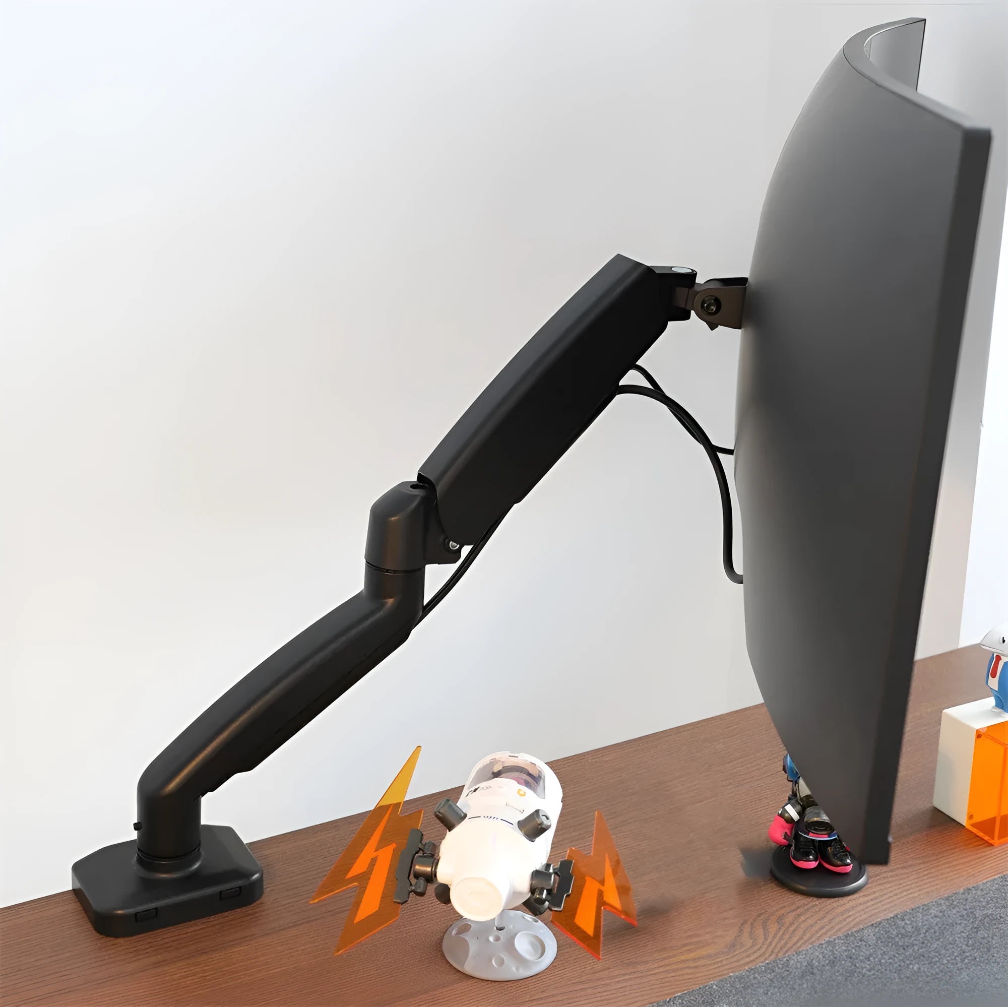 Black rotating telescopic LCD screen bracket on table with elevated display