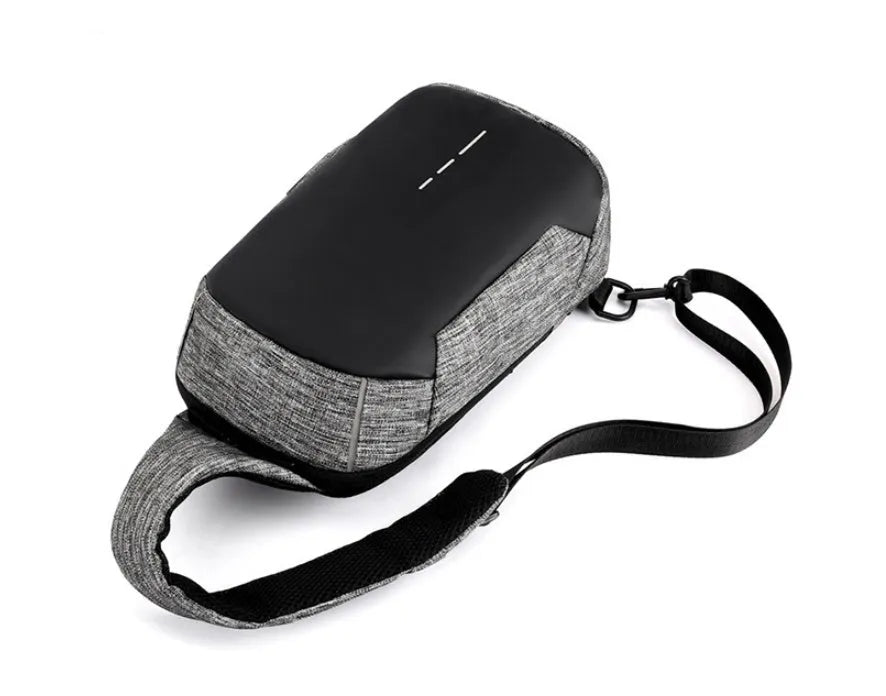 Small square Oxford waterproof chest bag in dark blue with internal phone pocket and single strap