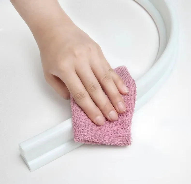 Flexible silicone bathroom waterproof strip in black, grey and white colours for shower room floor water blocking
