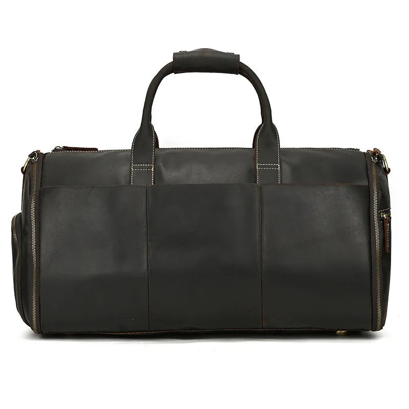 Vintage 22 inch brown leather duffle bag made from top layer cowhide, folding design with zipper closure on plain background