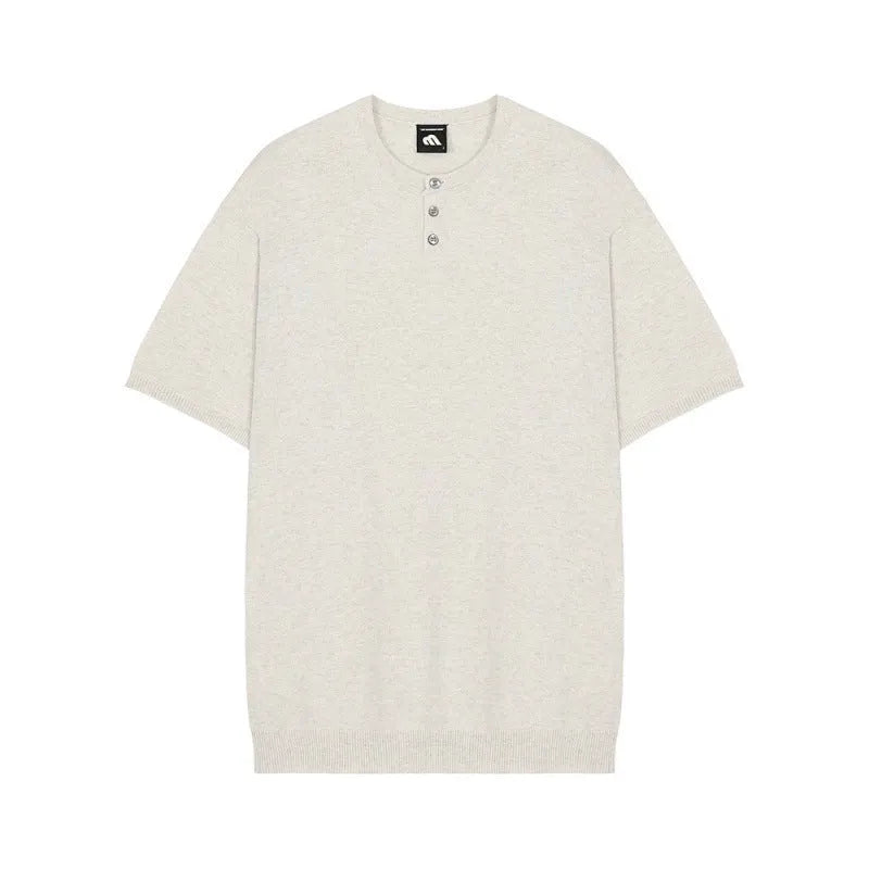Man wearing a thin black short-sleeved ice silk knitted pullover shirt with a slim loose fit.