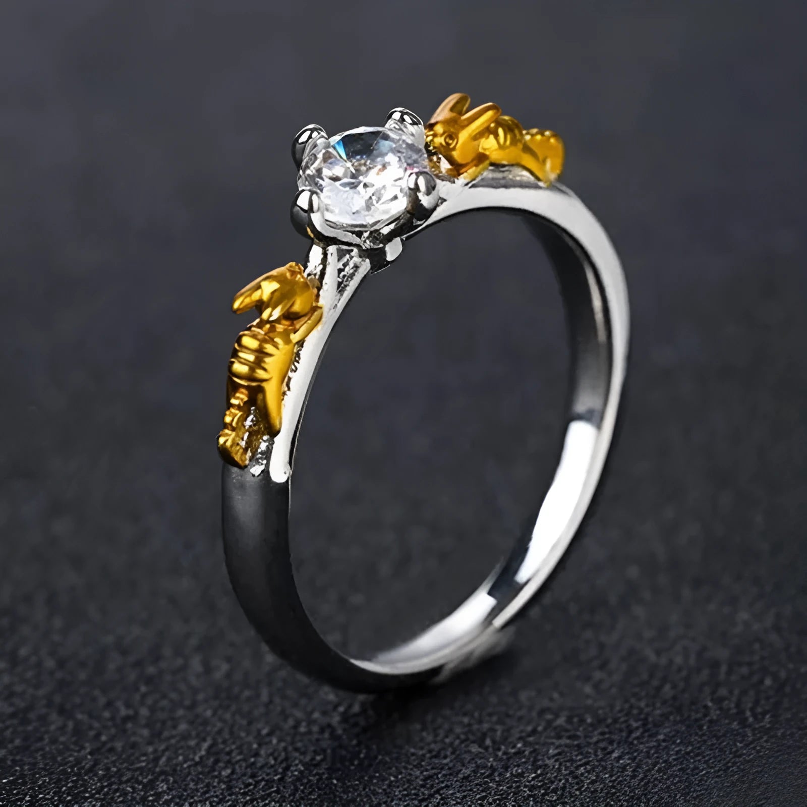 Copper crown fashion ring with black gold crystal centrepiece shown in individual packaging