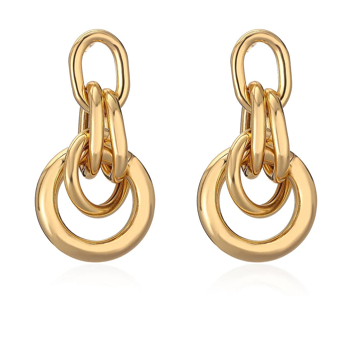 Geometric gold-colour drop earrings with irregular details and high-profile construction