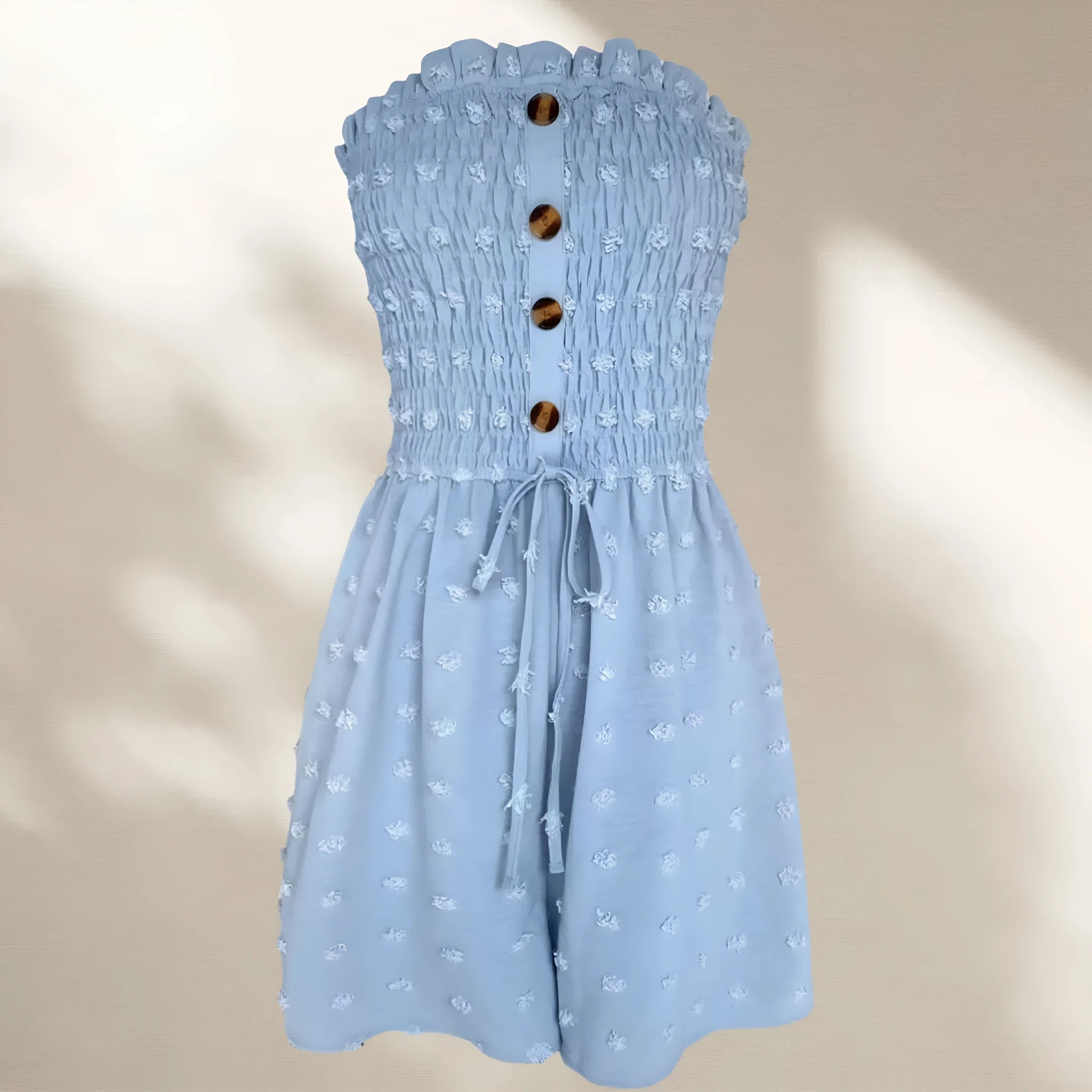 Women's blue off-shoulder jumpsuit with sleeveless design and button details