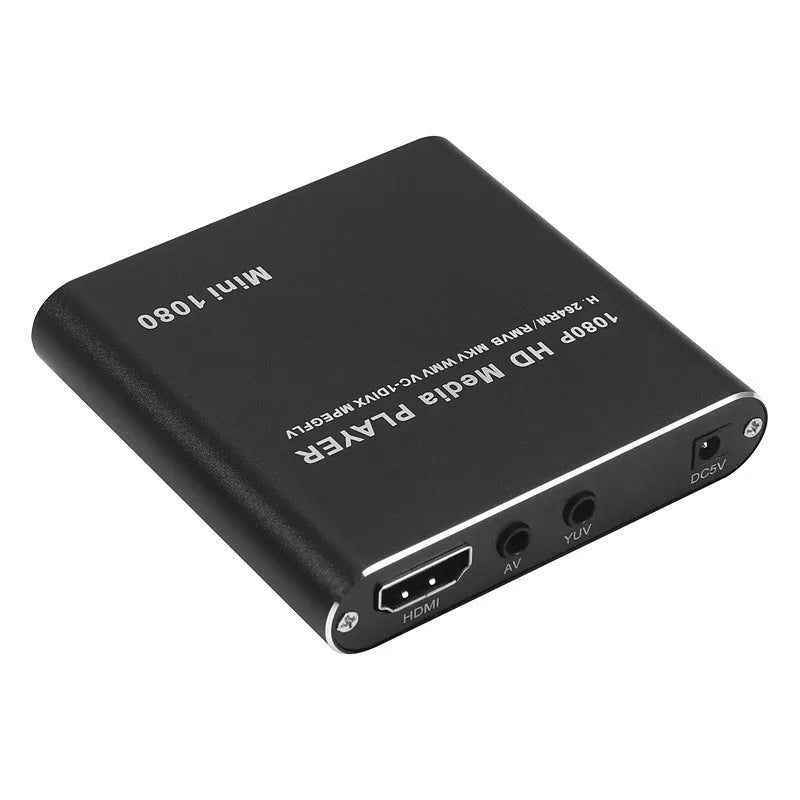 Compact black and blue all-metal 1080p HD media player with remote control on a wooden surface.
