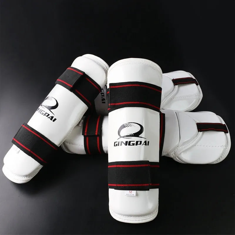 Taekwondo protective gear set showing arm guards, elbow arm guards, and leg protectors in PU EVA foam.