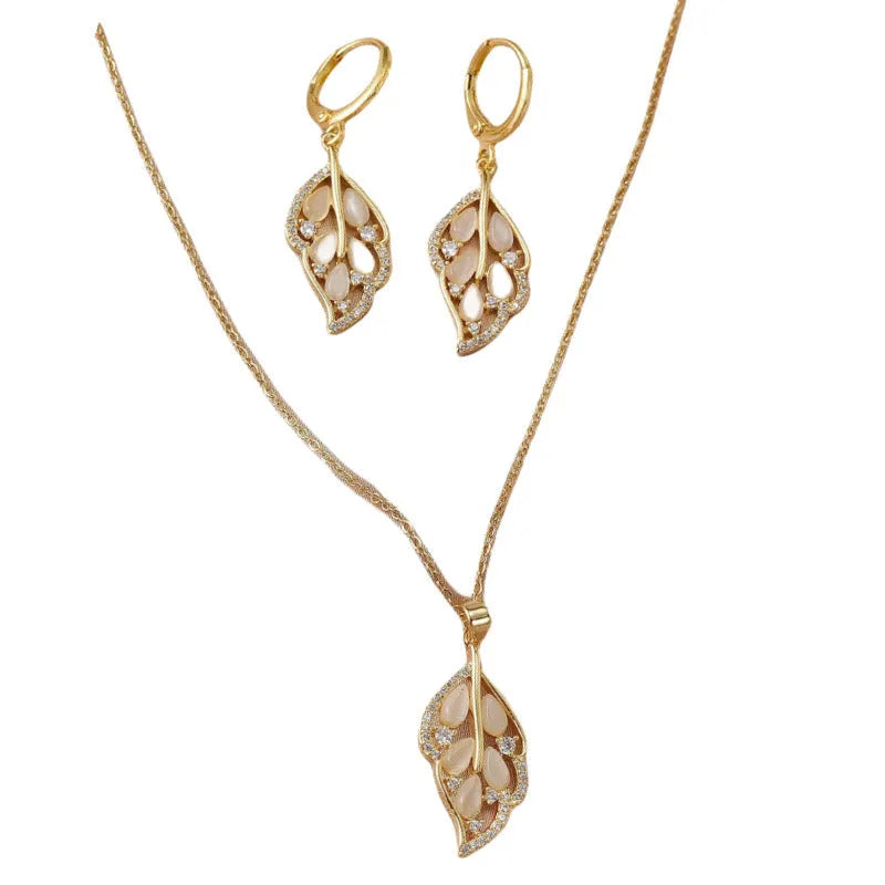 Opal leaves copper electroplated necklace and earrings set on display
