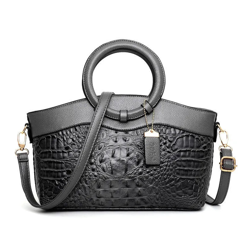 Fabric ladies shoulder handbag showing zipper compartments in one of six available colours