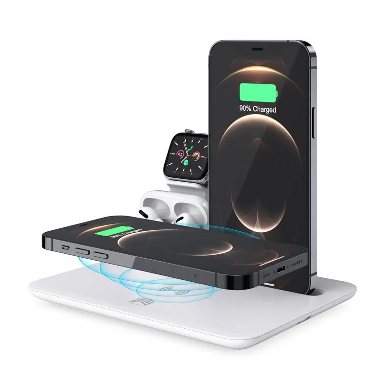 Black desktop wireless charging station with phone on pad, watch in bracket, and headphones on hook.