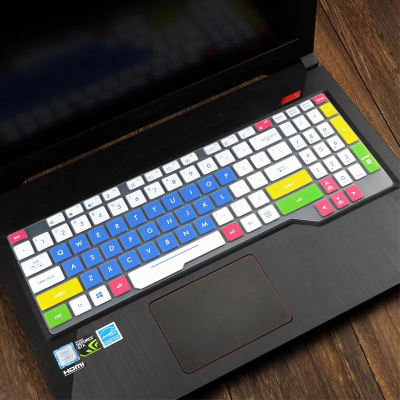 ASUS VivoBook 15 X513 laptop with a translucent mint coloured silicone keyboard protector fitted.