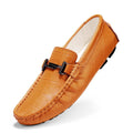 Men's black leather casual shoes with a metal belt buckle on the front and a flat rubber sole.