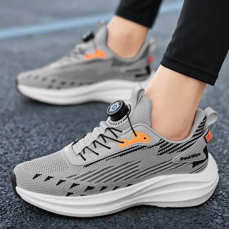Men's low-top white green sports running shoe with rotating buckle and lace-up closure on a TPU sole.