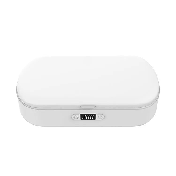 White ABS wireless UV steriliser and charging box with display showing dimensions and phone inside.