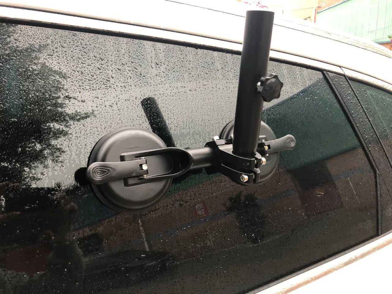 Black off-road vehicle flagpole sucker base with round suction cup and rubber disc