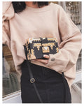 Hard PU leather women's flap handbag with single adjustable shoulder strap in black or green
