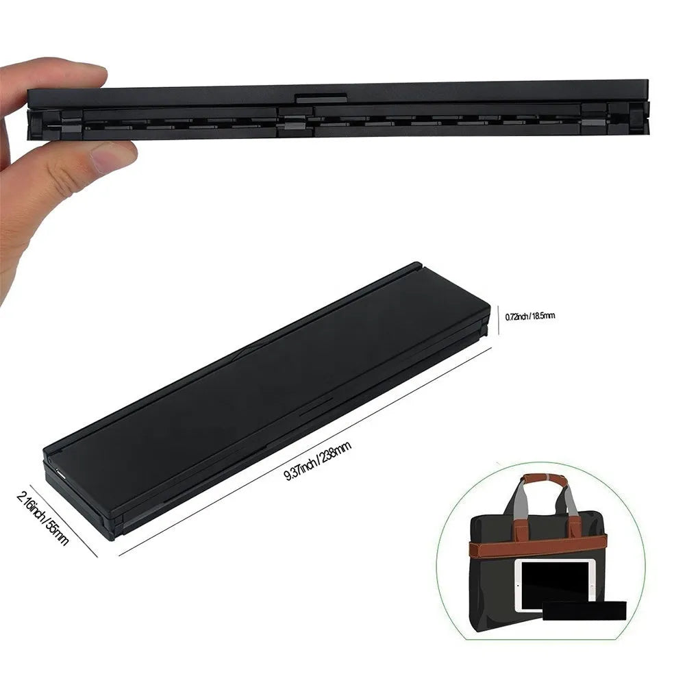 Black mini folding wireless Bluetooth keyboard for tablets with wrist support and aluminium bottom