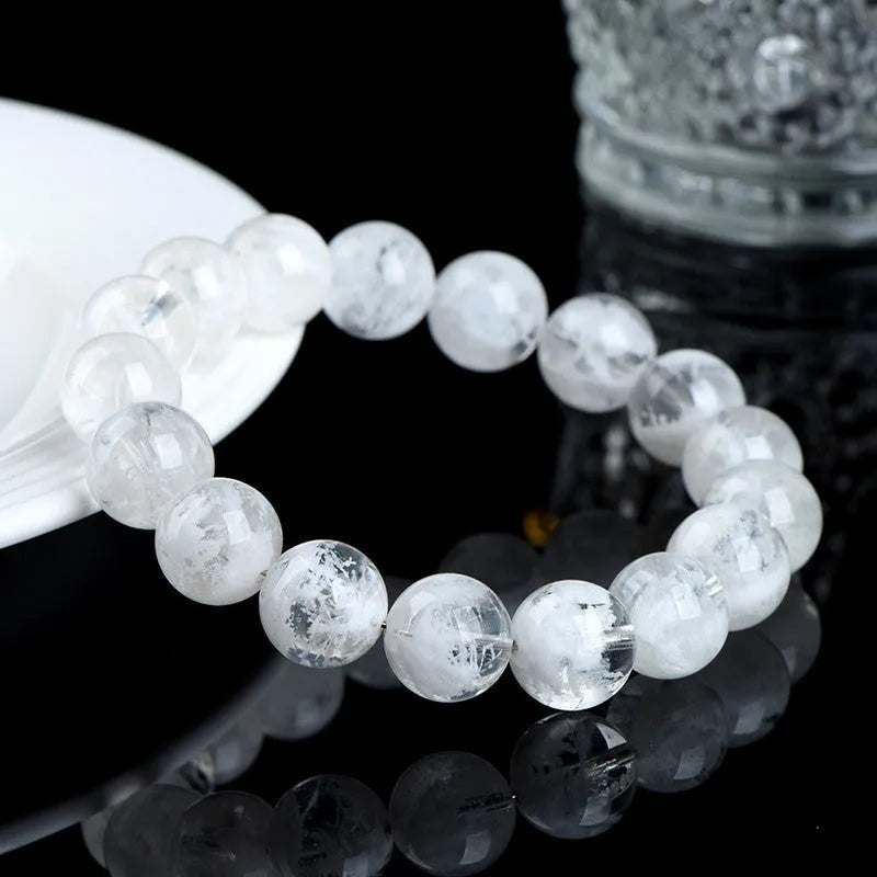 Women's crystal bracelet with blizzard snowflake round beads featuring ruyi and xiangyun design elements.