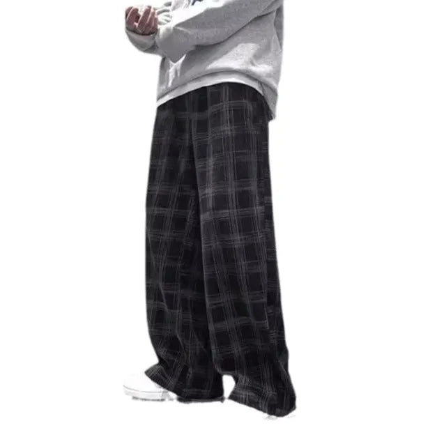Men's black and green plaid pattern loose-fit straight-leg casual trousers on mid-waist