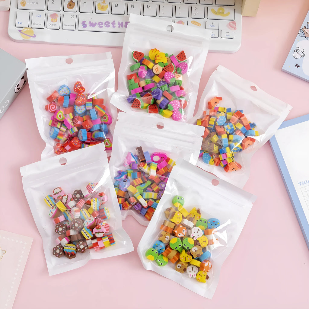 50 small colourful cartoon erasers featuring fruit, animal, cake, and theme designs in a pearlescent bag.