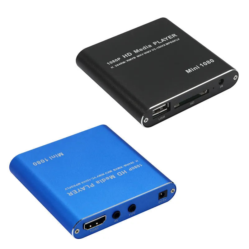 Compact black and blue all-metal 1080p HD media player with remote control on a wooden surface.