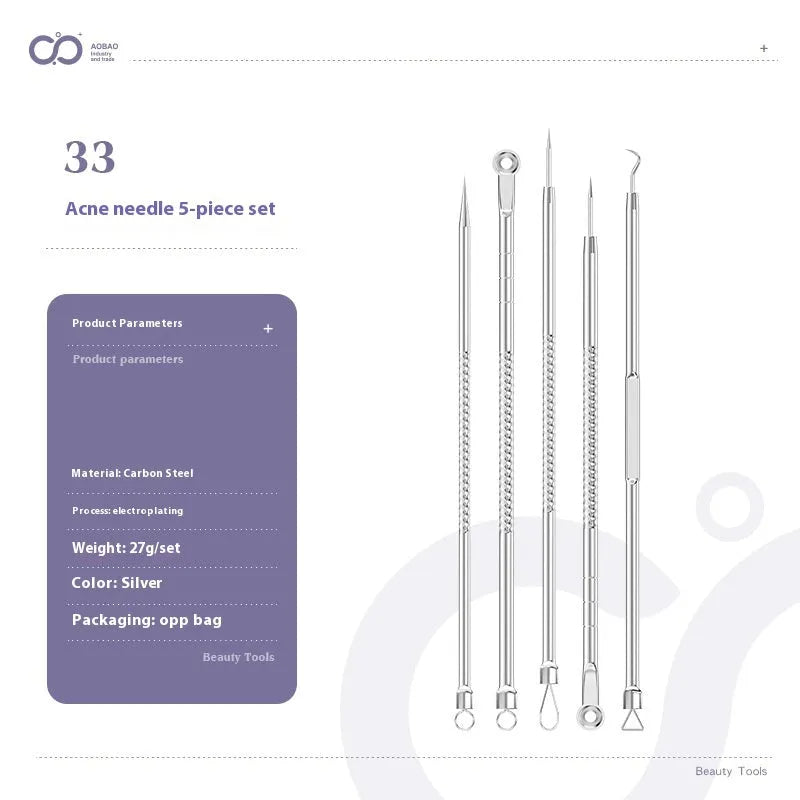 Four silver metal acne needles with pointed tips laid out on a surface.
