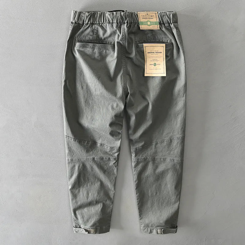 Men's loose-fit cotton casual overalls in army green colour showing mid-waist design
