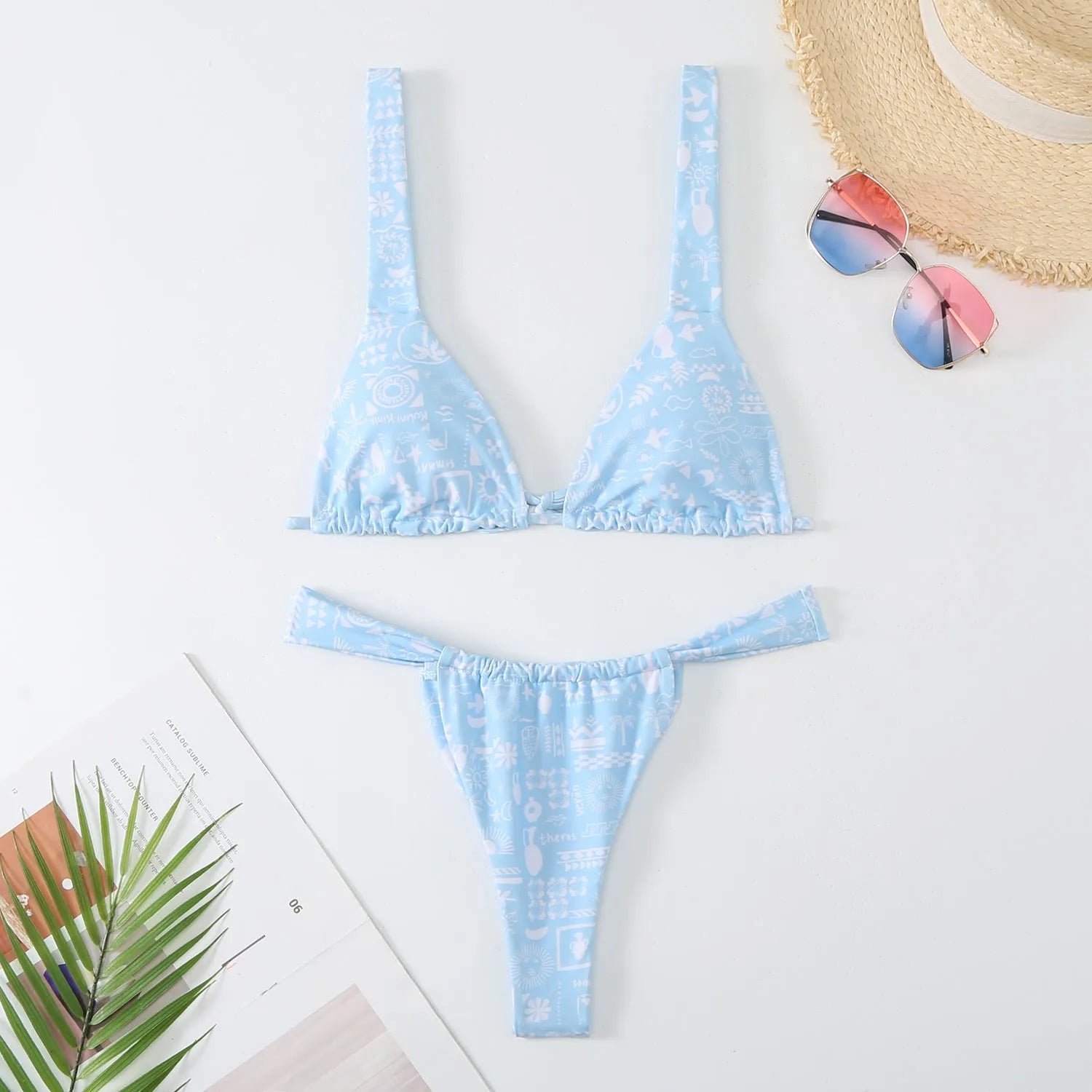 Women's floral print bikini swimsuit in rose red, white, blue, or sky blue colours with two-piece design
