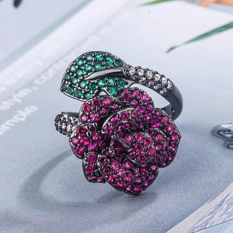 Geometric black gold flower personality ring for women on a copper base.