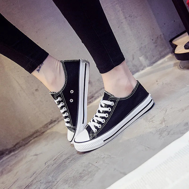 Women's solid colour canvas summer shoes available in black, white black, white red, and all black colour options.