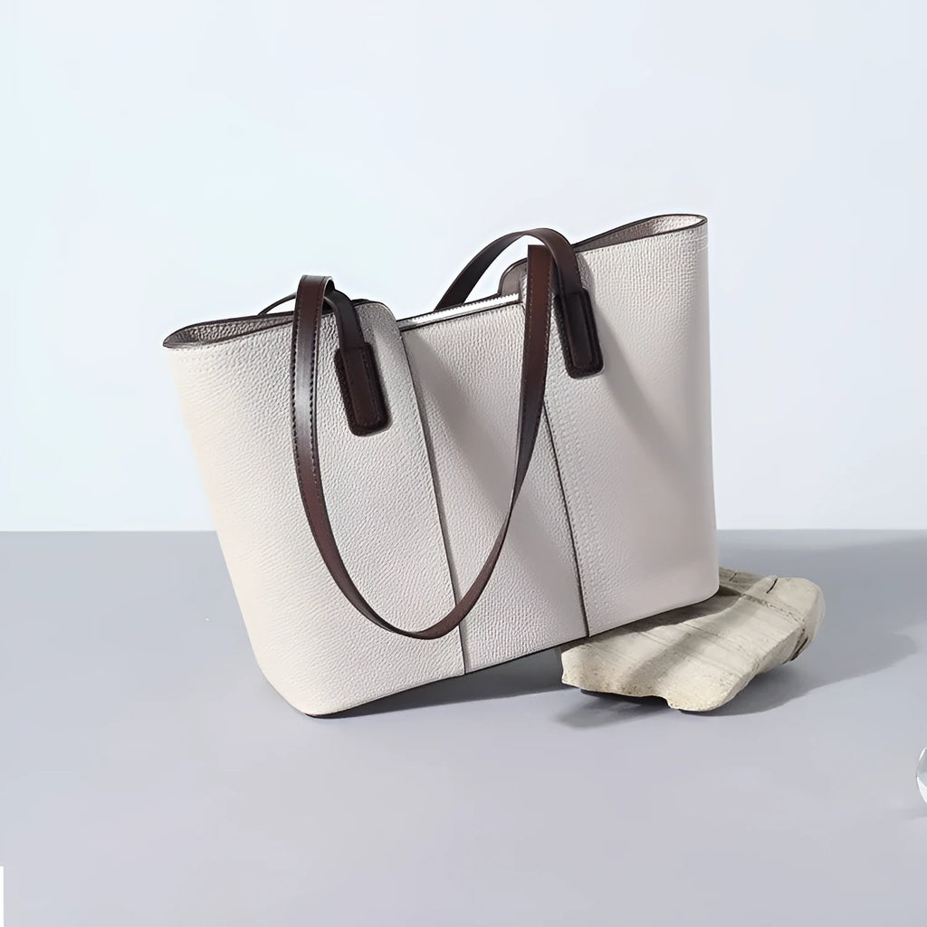 Genuine leather box-type shoulder bag in khaki colour with a sewing line detail and sandwich pocket.