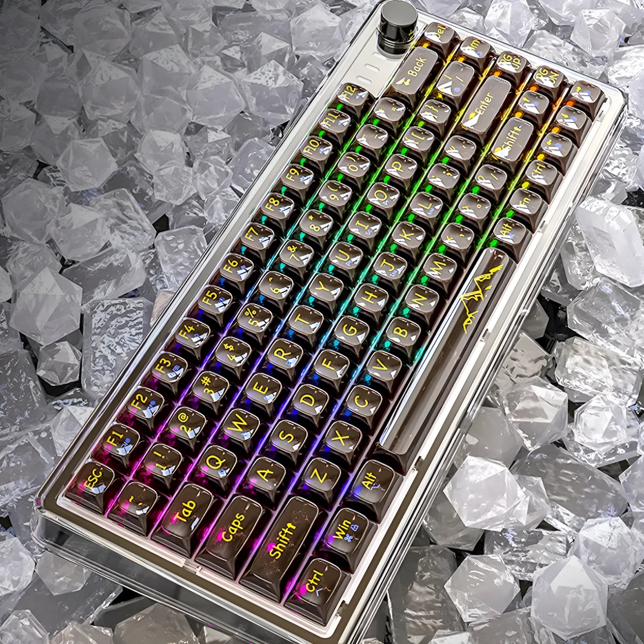 Attack Shark K75RGB transparent wireless mechanical keyboard with RGB lighting on a desk.