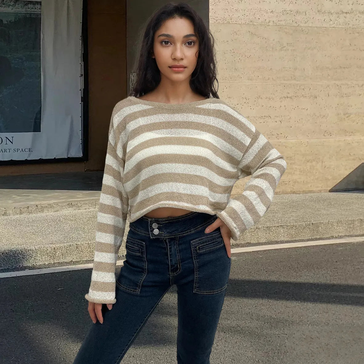 Striped long-sleeved pullover sweater in mercerised cotton, shown in multiple colours with front-and-back wearable design