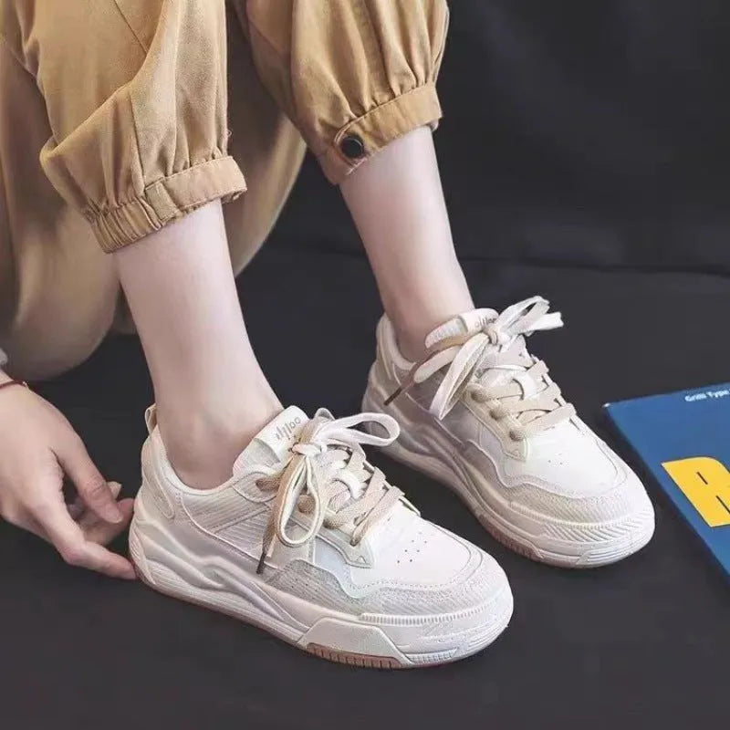 Beige and pink women's low-top rubber sneakers with a hidden height increase sole.