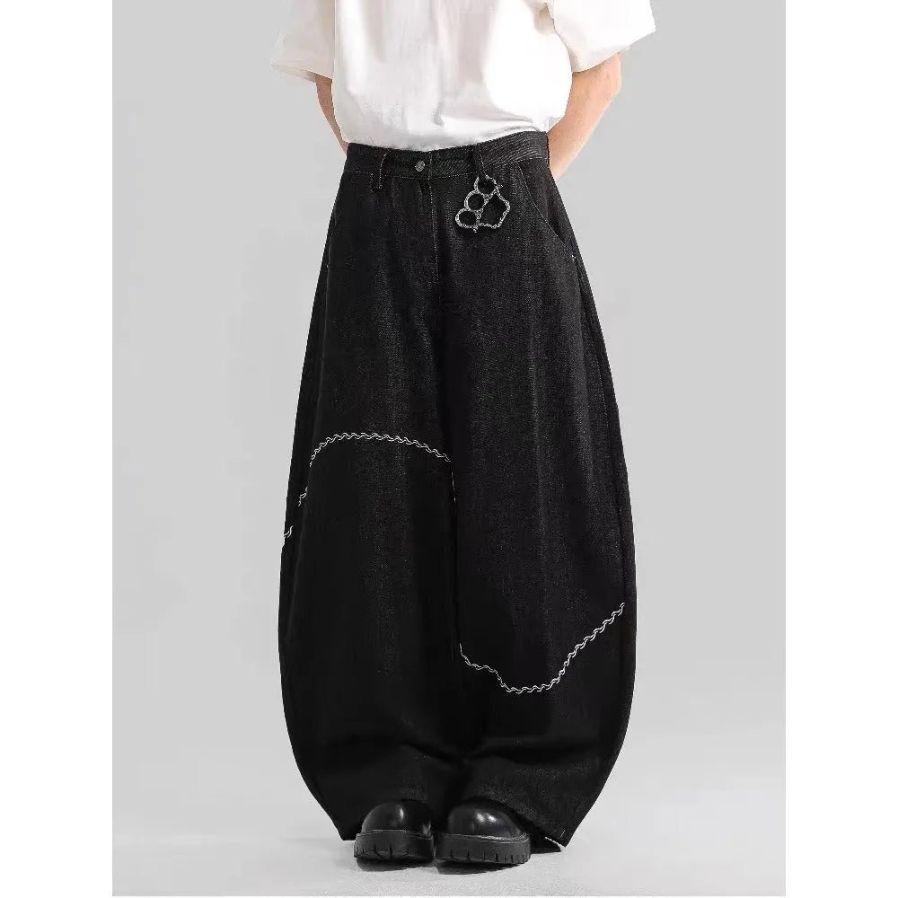 Black straight-leg denim trousers with mid-waist design and zip fly closure