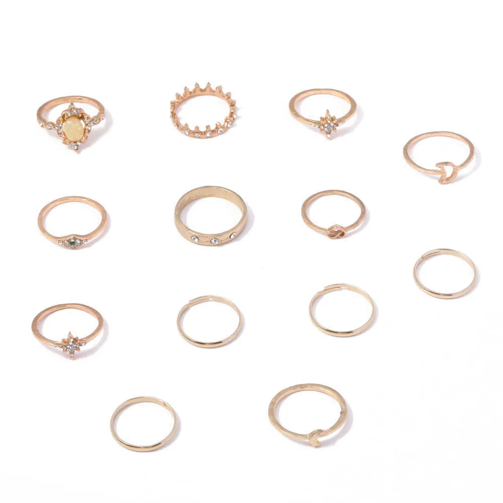 Vintage star moon rhinestone ring set of 13 pieces in gold and silver on display