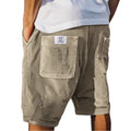 Men's gray corduroy shorts with multiple pockets showing straight leg cut and textured fabric