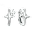 Sterling silver minimalist star ear clips with oxidised finish and clip-on fastening