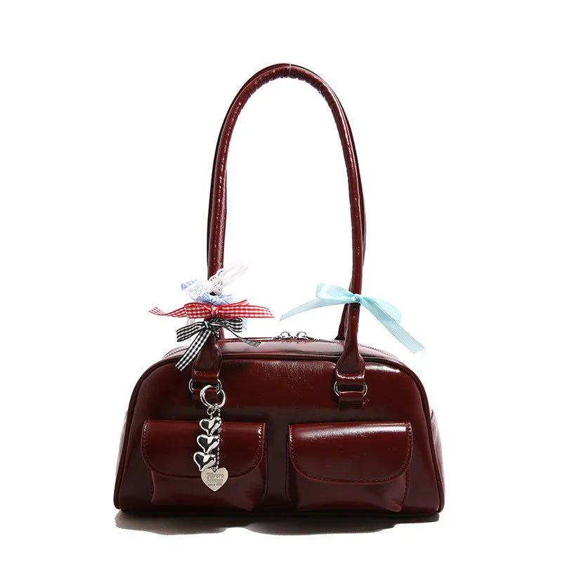 Women's retro PU leather pillow shoulder bag with flap closure in black colour