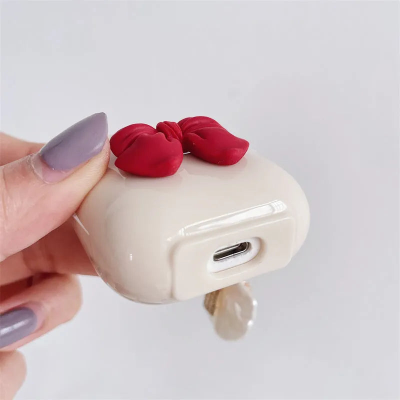 Beige red TPU clamshell earphone case with bow shell design for AirPods protection