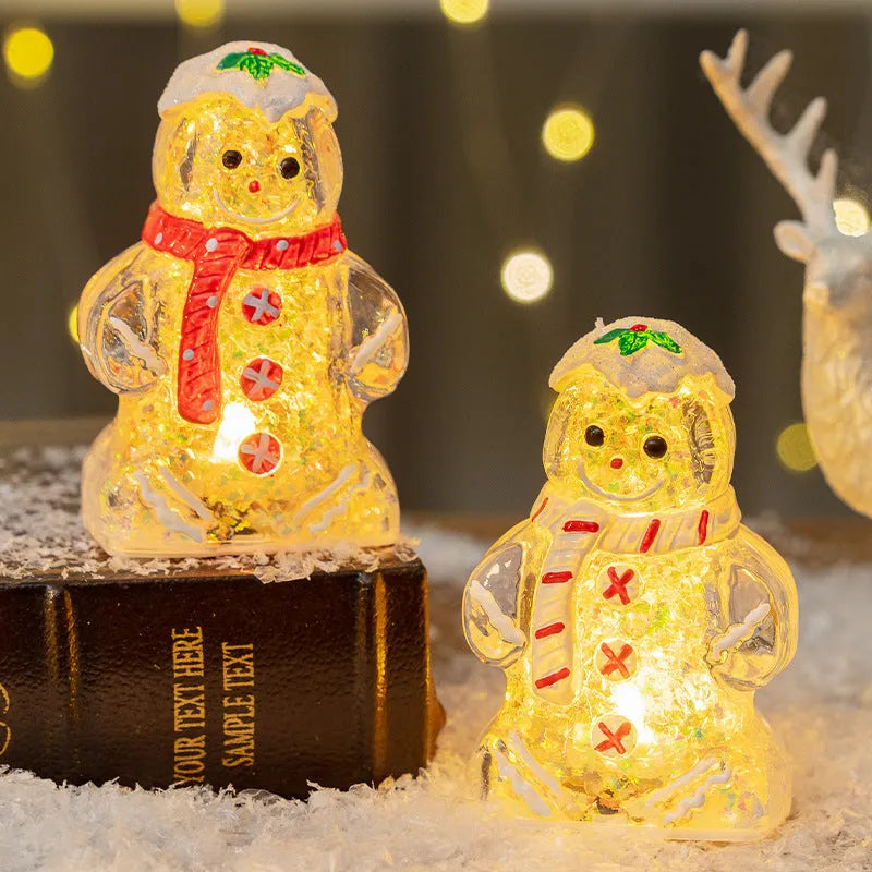 Set of four glowing plastic gingerbread man Christmas ornaments with red, white, and transparent scarves on a festive background.