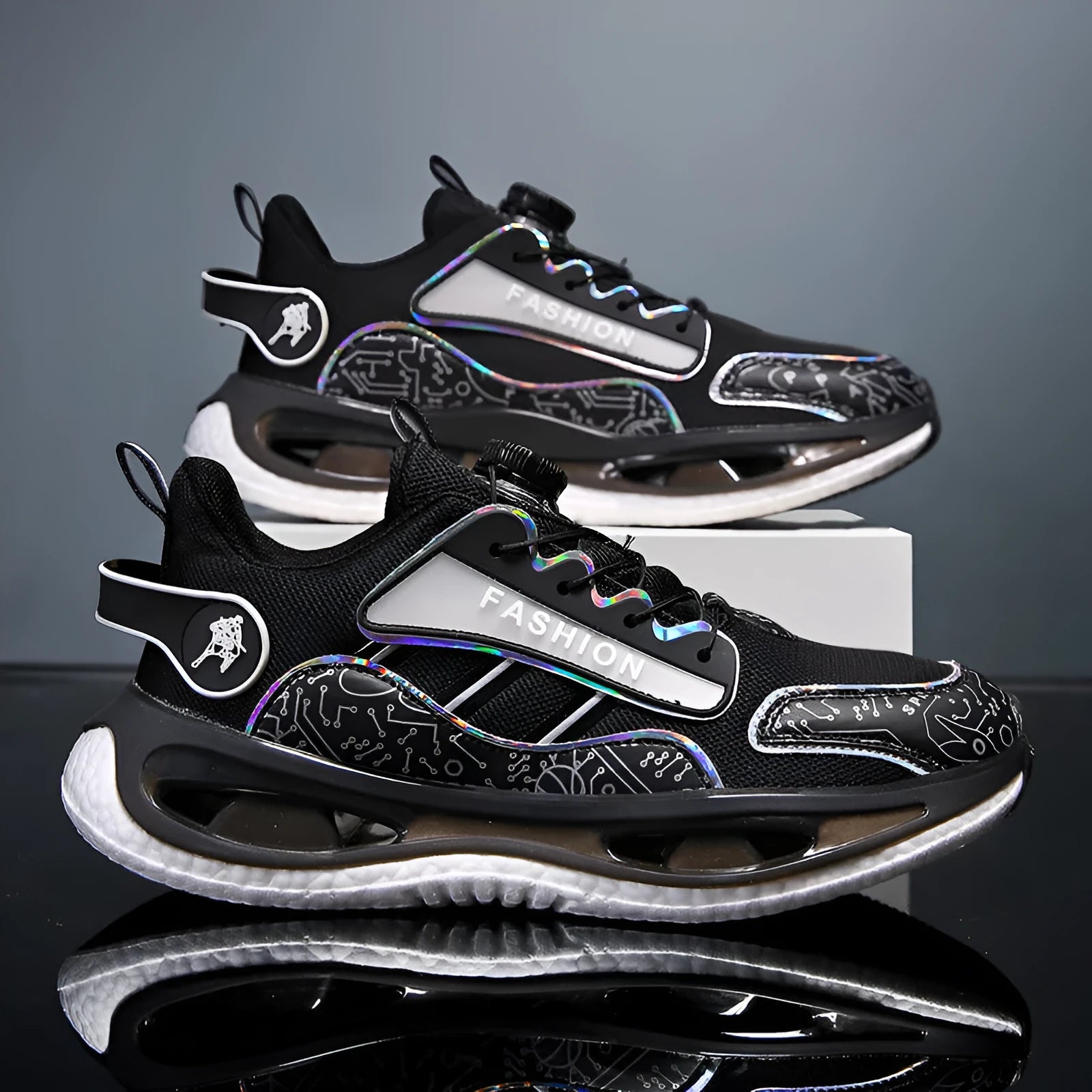 Men's low-top mesh sports shoes in black with an elastic band closure and a light-coloured sole.
