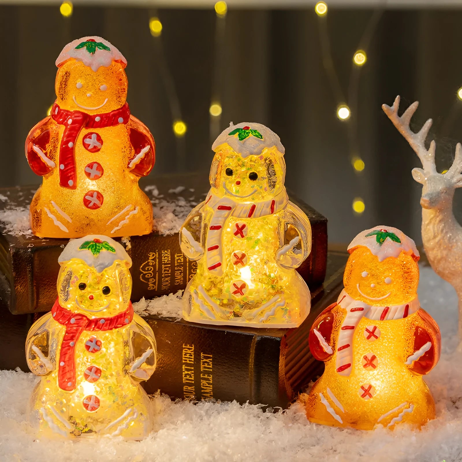 Set of four glowing plastic gingerbread man Christmas ornaments with red, white, and transparent scarves on a festive background.