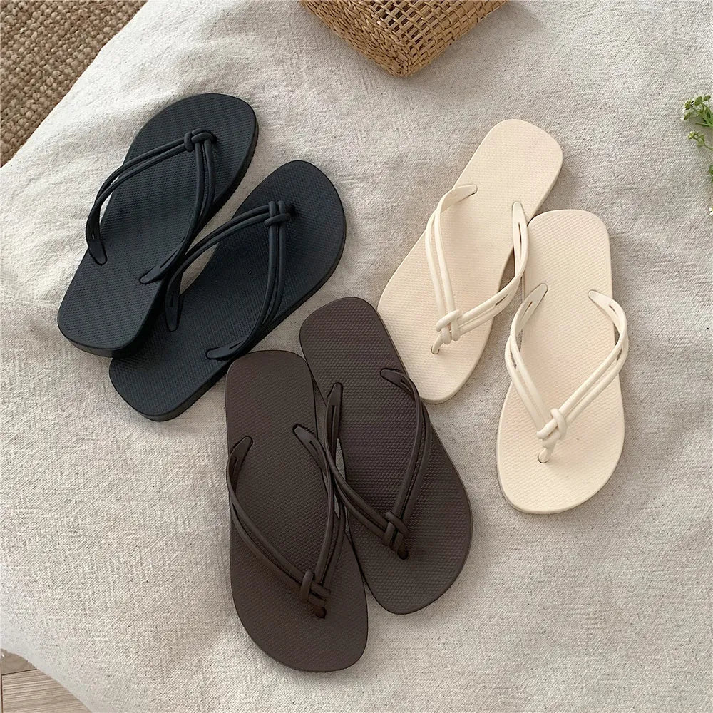 Women's casual PVC flip flops with toe covering style and injection moulded non-slip sole in multiple colour options.