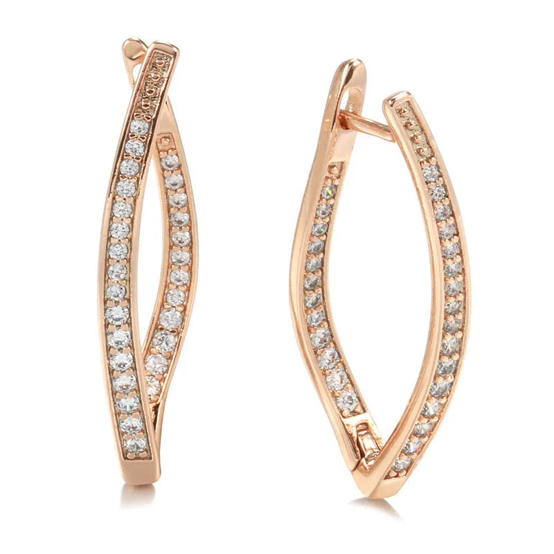 A pair of geometric drop earrings for women made from copper with zircon accents in H0493 colour.