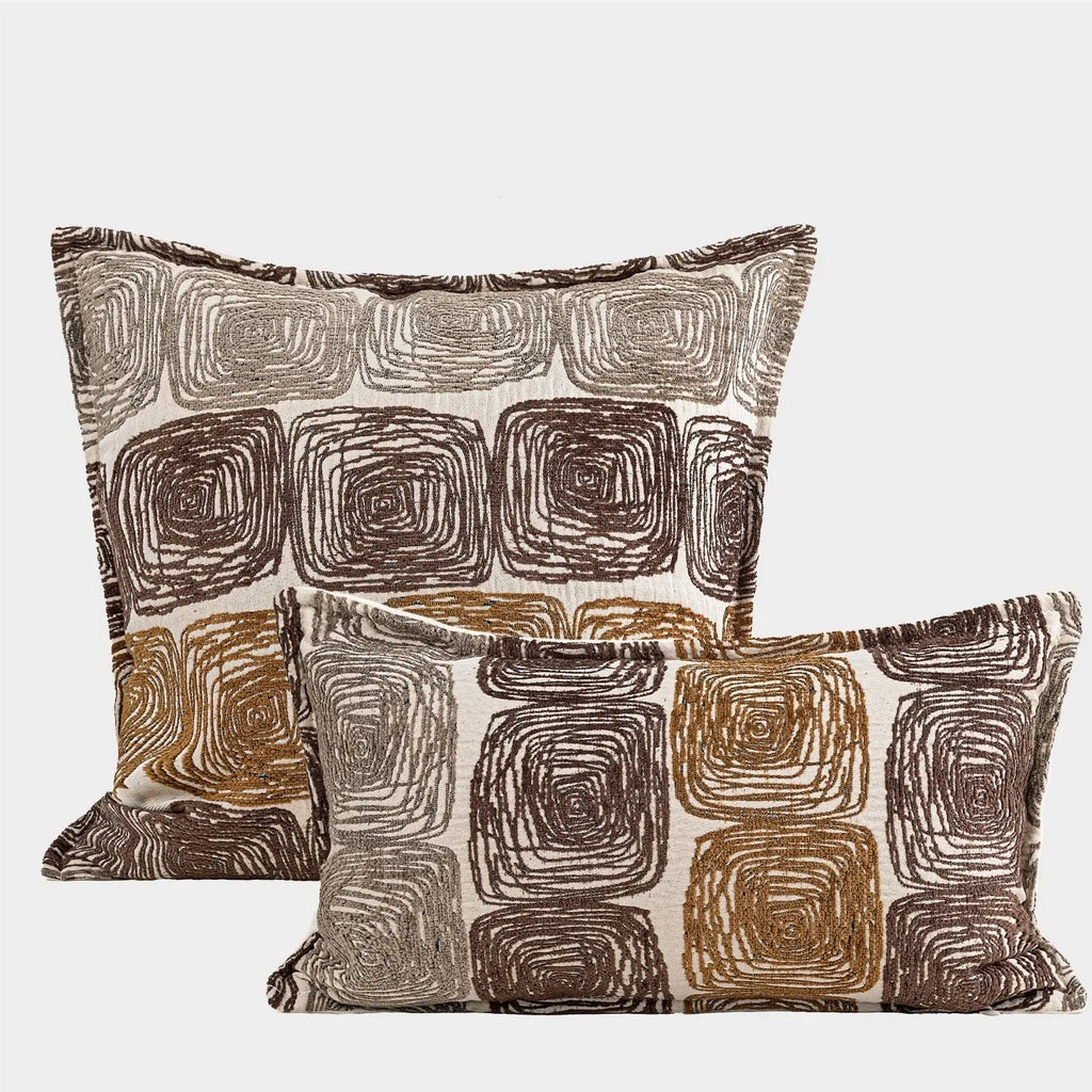 Abstract coil pattern pillow cover in cream and coffee colours showing square and rectangular dimensions