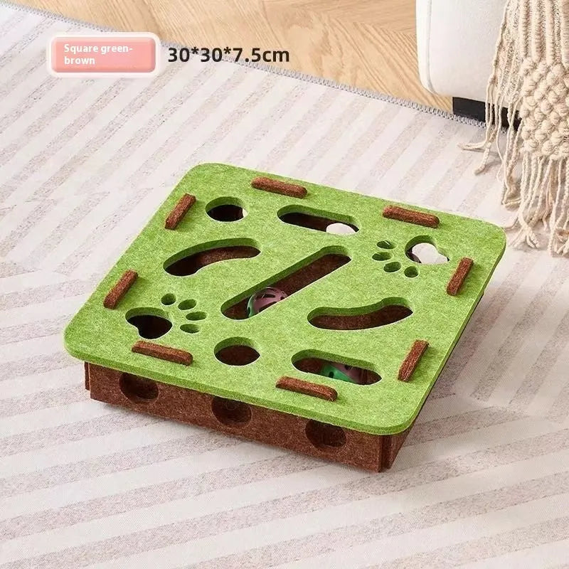 Green brown felt cat toy box with holes for interactive hiding games.