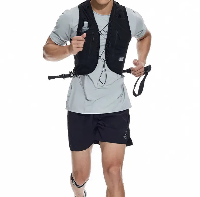 Laser-stitched black running shorts with stretch Spandex fabric laid flat.